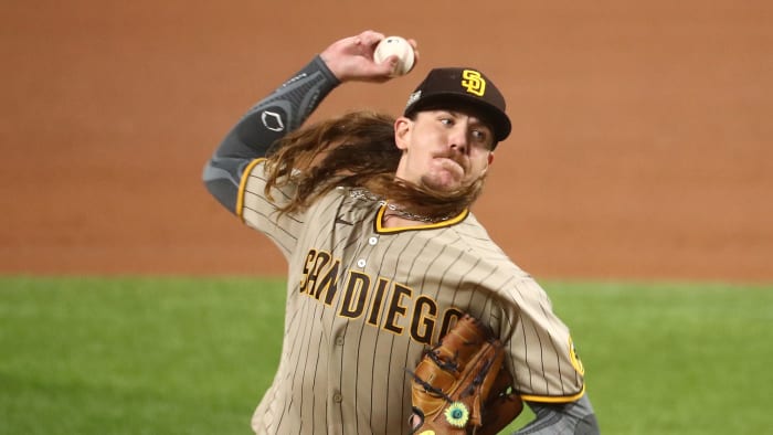 San Diego Padres starting pitcher Mike Clevinger (52) pitches against the Los Angeles Dodgers during the first inning in game one of the 2020 NLDS at Globe Life Field.
